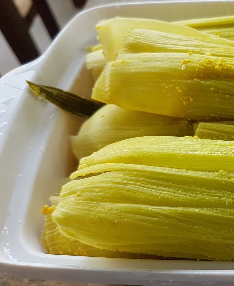 Freshly steamed binaki corn tamales wrapped in husk, Bukidnon