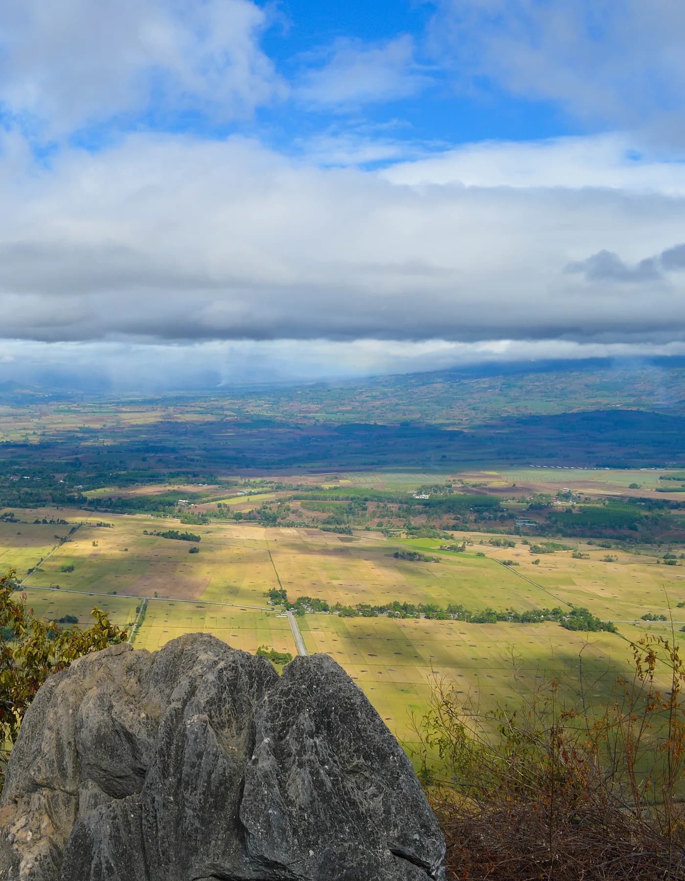 Valley view over Malaybalay's fields from the limestone summit of Mt. Capistrano
